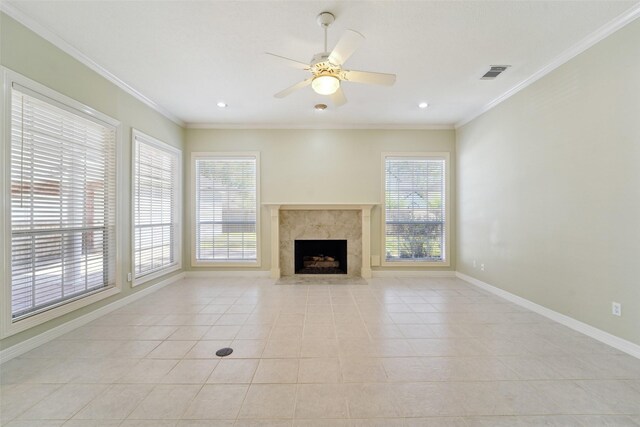 1706 Lofty Maple Trl, Houston, TX 77345 - unfurnished living room with light tile patterned floors, baseboards, a ceiling fan, a premium fireplace, and crown molding