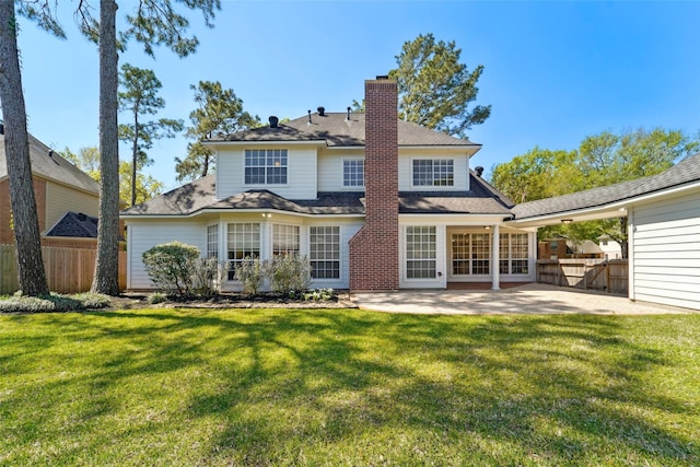 1706 Lofty Maple Trl, Houston, TX 77345 - back of house with a patio and a chimney