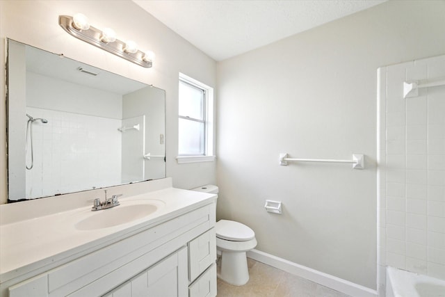 bathroom with toilet, tile patterned flooring, vanity, baseboards, and shower / washtub combination