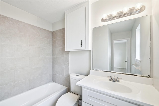 full bathroom with toilet, vanity, and shower / tub combination