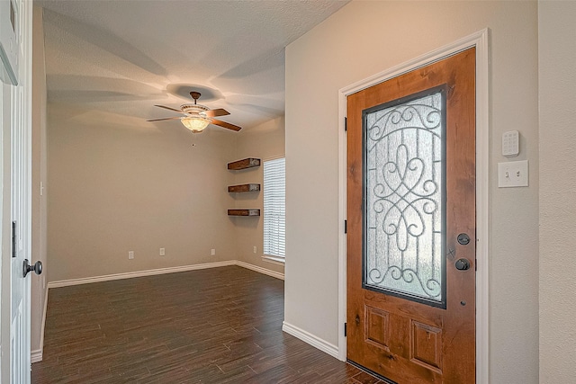23123 Sandpiper Trl, Spring, TX 77373 - entryway featuring ceiling fan, dark wood-style floors, and baseboards