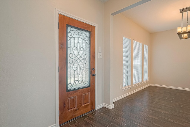 23123 Sandpiper Trl, Spring, TX 77373 - entryway with baseboards and dark wood-style floors