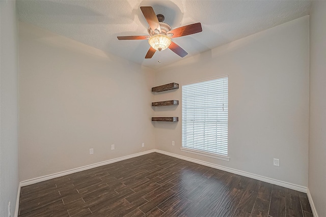 23123 Sandpiper Trl, Spring, TX 77373 - empty room featuring dark wood-style floors, baseboards, and a ceiling fan