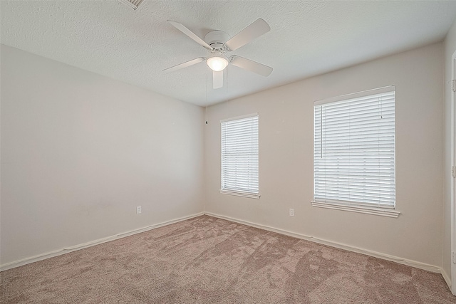 23123 Sandpiper Trl, Spring, TX 77373 - spare room featuring ceiling fan, carpet floors, baseboards, and a textured ceiling