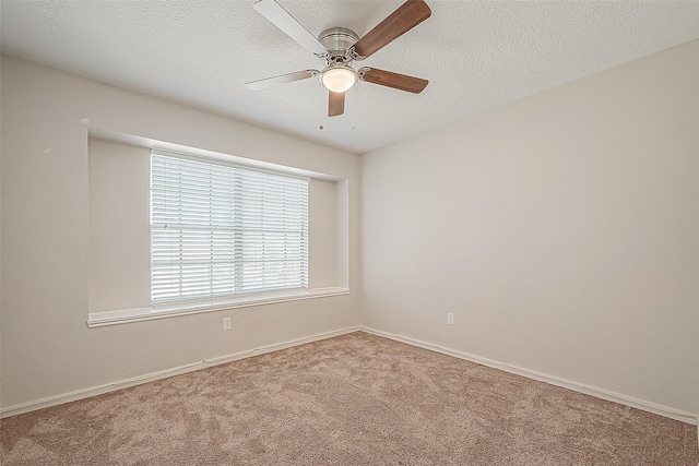 23123 Sandpiper Trl, Spring, TX 77373 - carpeted spare room featuring ceiling fan, baseboards, and a textured ceiling
