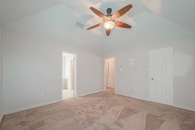 23123 Sandpiper Trl, Spring, TX 77373 - unfurnished bedroom with lofted ceiling, light carpet, baseboards, ensuite bathroom, and ceiling fan