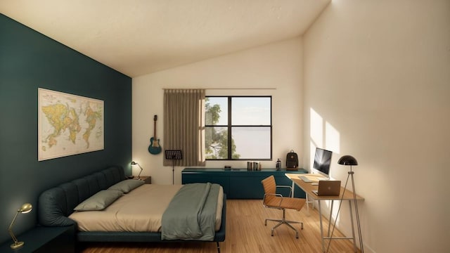 bedroom with lofted ceiling, a desk, and wood finished floors