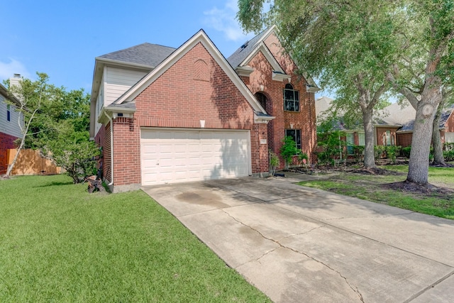 515 Deer Hollow Dr, Sugar Land, TX 77479 - traditional home featuring an attached garage, brick siding, and driveway