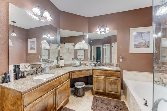 515 Deer Hollow Dr, Sugar Land, TX 77479 - bathroom with a bath, double vanity, and tile patterned flooring