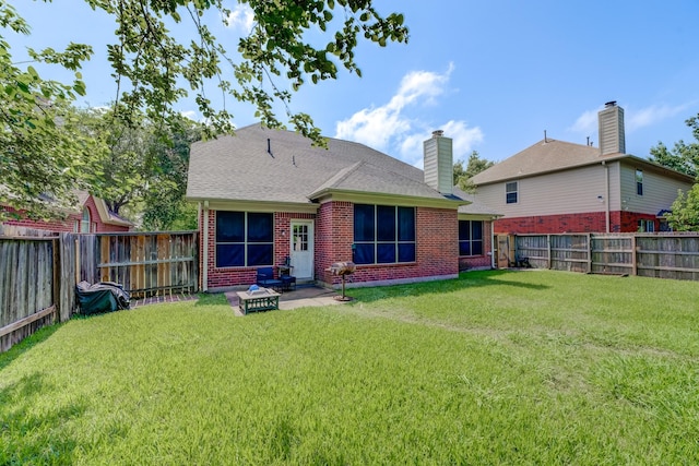 515 Deer Hollow Dr, Sugar Land, TX 77479 - back of property with brick siding, a chimney, and a shingled roof