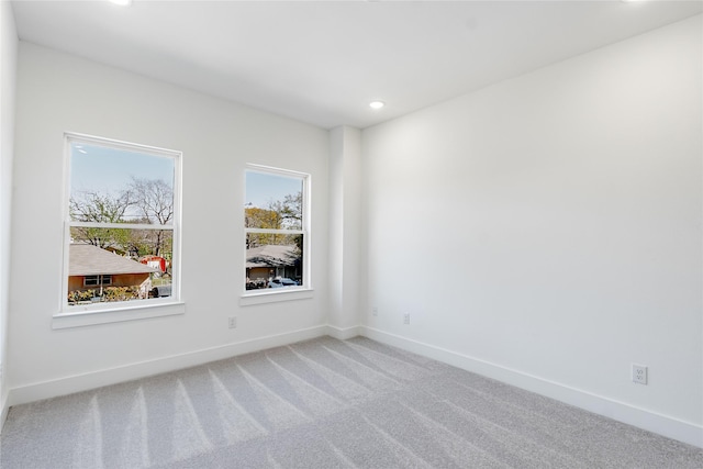 610 E 41st St Unit A B, Houston, TX 77022 - spare room featuring carpet flooring, recessed lighting, and baseboards