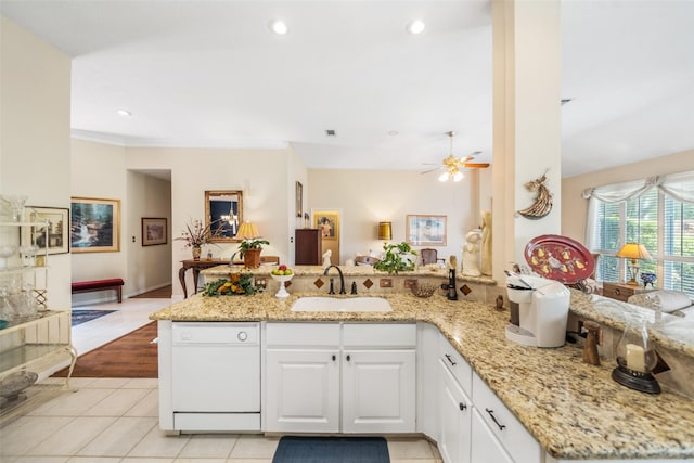 12938 Quail Park Dr, Cypress, TX 77429 - kitchen featuring a sink, white dishwasher, light stone countertops, white cabinetry, and recessed lighting