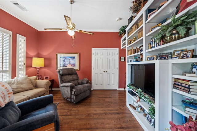 12938 Quail Park Dr, Cypress, TX 77429 - living area featuring ceiling fan, crown molding, dark wood-type flooring, and baseboards