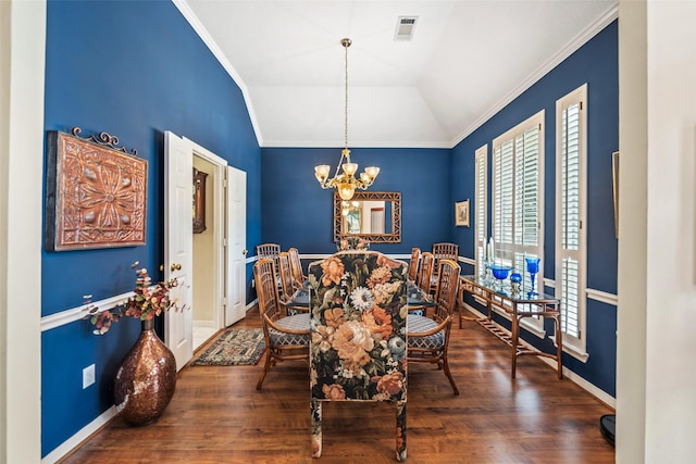 12938 Quail Park Dr, Cypress, TX 77429 - dining area featuring a chandelier, ornamental molding, wood finished floors, lofted ceiling, and baseboards
