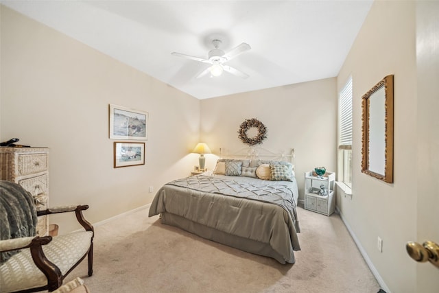 12938 Quail Park Dr, Cypress, TX 77429 - bedroom featuring light colored carpet, baseboards, and ceiling fan