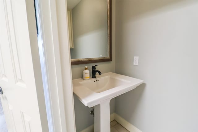 101 N Hall Dr, Sugar Land, TX 77478 - bathroom with baseboards and tile patterned flooring