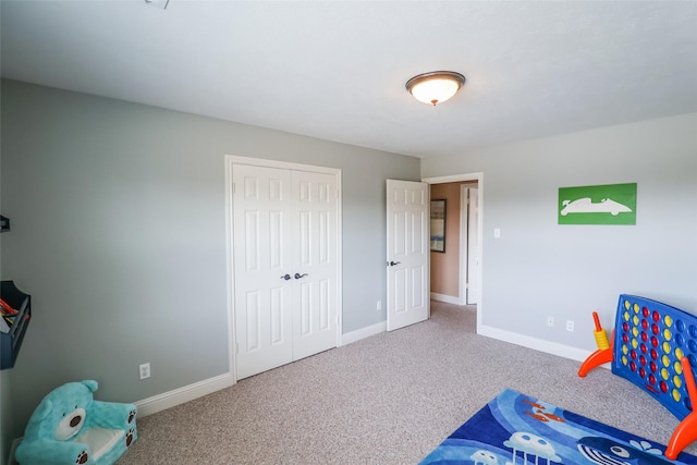 101 N Hall Dr, Sugar Land, TX 77478 - unfurnished bedroom featuring carpet, baseboards, and a closet