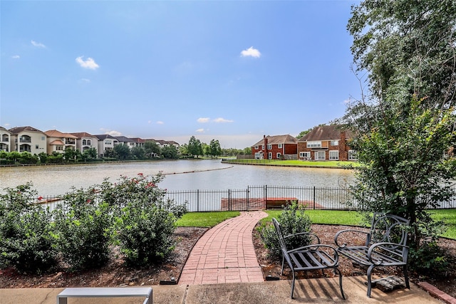 101 N Hall Dr, Sugar Land, TX 77478 - view of patio with fence, a water view, and a residential view