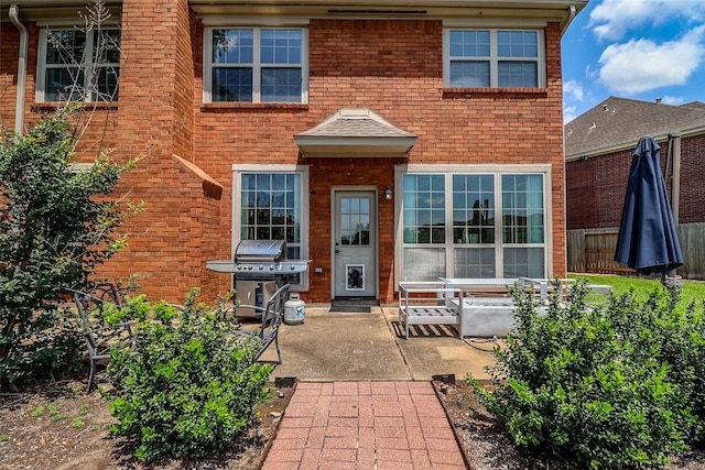 101 N Hall Dr, Sugar Land, TX 77478 - entrance to property with a patio area and fence
