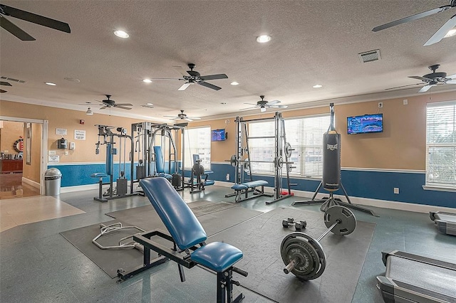 1711 Old Spanish Trl Unit 323, Houston, TX 77054 - gym featuring baseboards, crown molding, a textured ceiling, recessed lighting, and ceiling fan