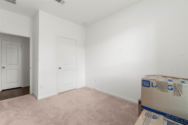 247 Pine Cavern Dr, Willis, TX 77378 - unfurnished bedroom with carpet flooring and baseboards