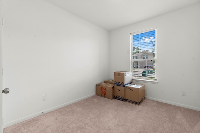 247 Pine Cavern Dr, Willis, TX 77378 - empty room with light colored carpet and baseboards
