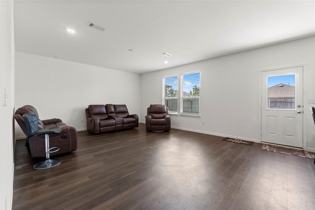 247 Pine Cavern Dr, Willis, TX 77378 - living area featuring dark wood finished floors, baseboards, and recessed lighting
