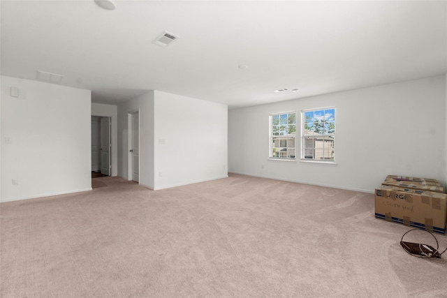 247 Pine Cavern Dr, Willis, TX 77378 - empty room with light colored carpet and baseboards