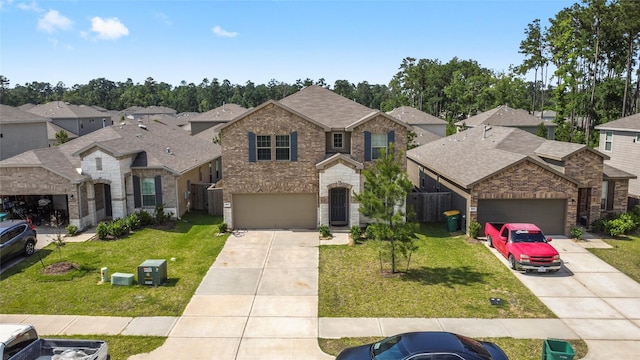 247 Pine Cavern Dr, Willis, TX 77378 - view of front facade with a residential view, concrete driveway, a front yard, and brick siding