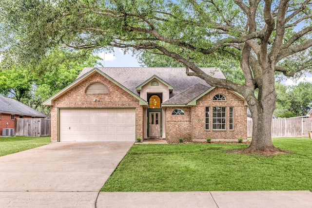 1408 Quail Holw, Sealy, TX 77474 - single story home with brick siding, a shingled roof, a garage, and concrete driveway