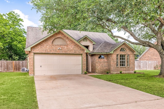 1408 Quail Holw, Sealy, TX 77474 - view of front of home featuring brick siding, a garage, roof with shingles, and concrete driveway