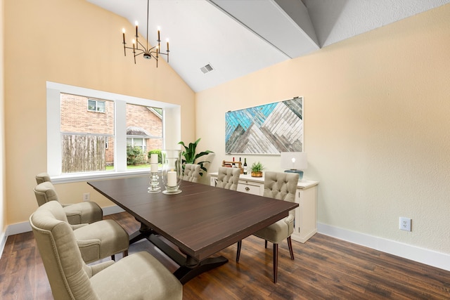 1408 Quail Holw, Sealy, TX 77474 - dining area with a chandelier, high vaulted ceiling, dark wood finished floors, and baseboards