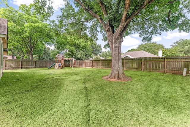 1408 Quail Holw, Sealy, TX 77474 - view of yard featuring a playground