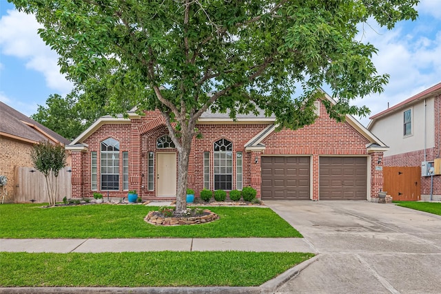 19123 Dee Woods Dr, Humble, TX 77346 - traditional-style home featuring brick siding, a garage, and concrete driveway