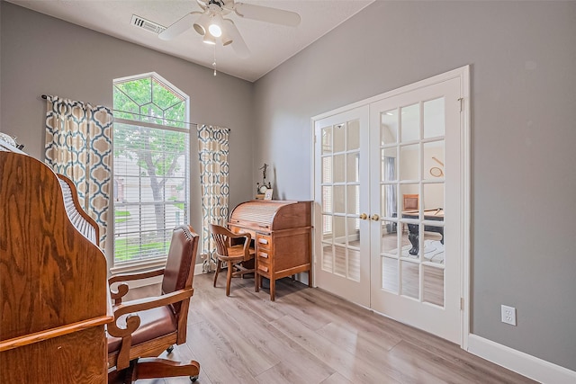 19123 Dee Woods Dr, Humble, TX 77346 - office featuring french doors, ceiling fan, light wood-type flooring, and healthy amount of natural light