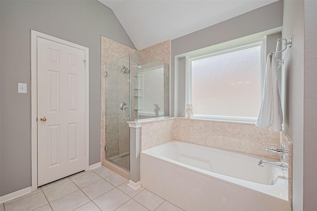 19123 Dee Woods Dr, Humble, TX 77346 - bathroom with tile patterned flooring, a stall shower, a garden tub, and lofted ceiling