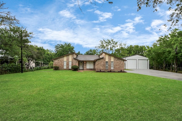 2257 County Road 206, Alvin, TX 77511 - mid-century home with brick siding, an outbuilding, a detached garage, and concrete driveway