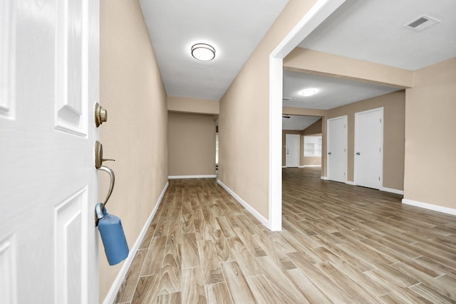 2257 County Road 206, Alvin, TX 77511 - foyer featuring light wood finished floors and baseboards