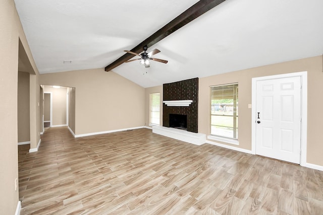 2257 County Road 206, Alvin, TX 77511 - unfurnished living room with light wood finished floors, a ceiling fan, and baseboards