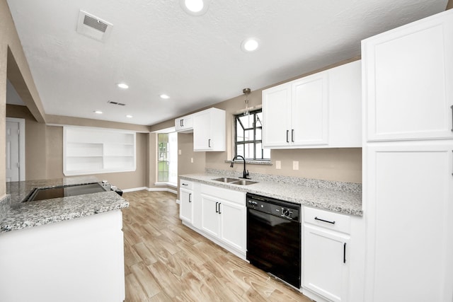 2257 County Road 206, Alvin, TX 77511 - kitchen with dishwasher, a sink, white cabinetry, light wood-type flooring, and light stone countertops