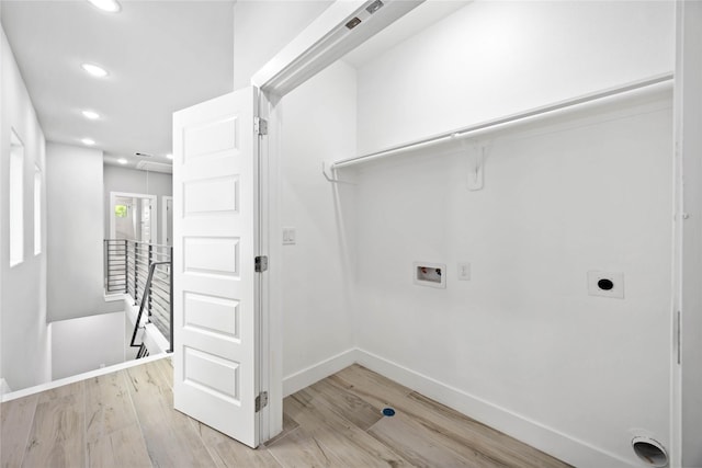 laundry area with washer hookup, electric dryer hookup, baseboards, light wood-type flooring, and recessed lighting