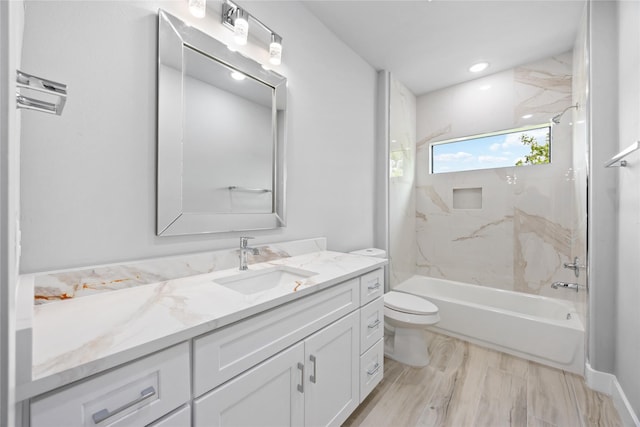 full bathroom with toilet, vanity, and shower / bathtub combination
