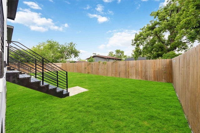 view of yard with stairway
