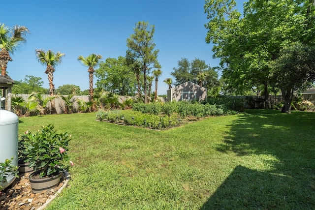104 Smith Ln, League City, TX 77573 - view of yard featuring a storage unit and an outbuilding