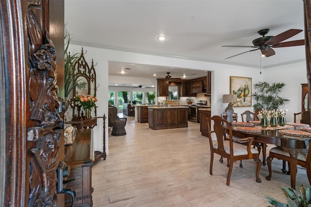 104 Smith Ln, League City, TX 77573 - dining room featuring ceiling fan, light wood-style flooring, and recessed lighting