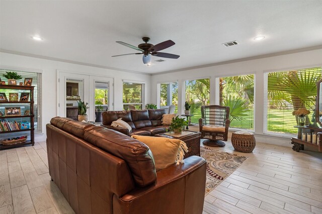 104 Smith Ln, League City, TX 77573 - living room featuring healthy amount of natural light, a ceiling fan, light wood-style floors, and recessed lighting