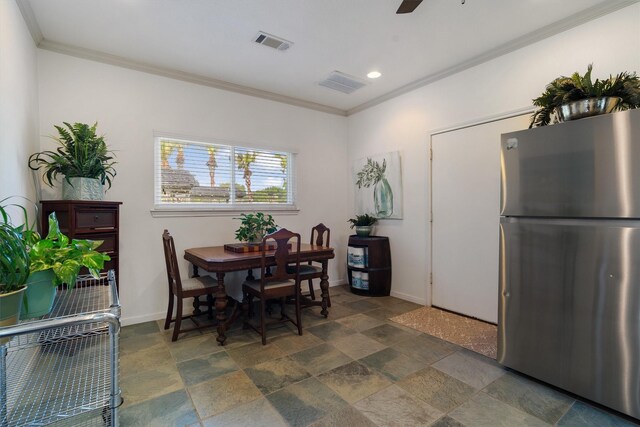 104 Smith Ln, League City, TX 77573 - dining space with crown molding, baseboards, dark stone finish floors, recessed lighting, and a ceiling fan