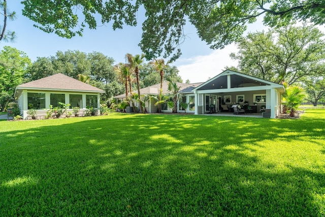 104 Smith Ln, League City, TX 77573 - view of grassy yard featuring a patio