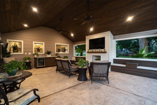 104 Smith Ln, League City, TX 77573 - view of patio / terrace with a ceiling fan and an outdoor living space with a fireplace