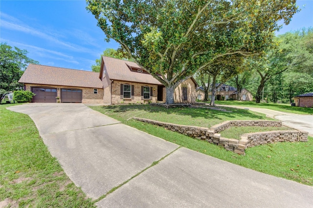 1223 Green Briar Dr, Huntsville, TX 77340 - view of front of house with driveway, a front lawn, a garage, roof with shingles, and brick siding